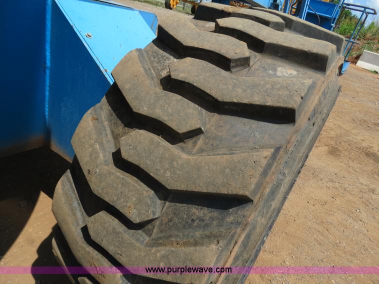 image for item B2387 1999 Genie Z-60/34 articulating boom lift