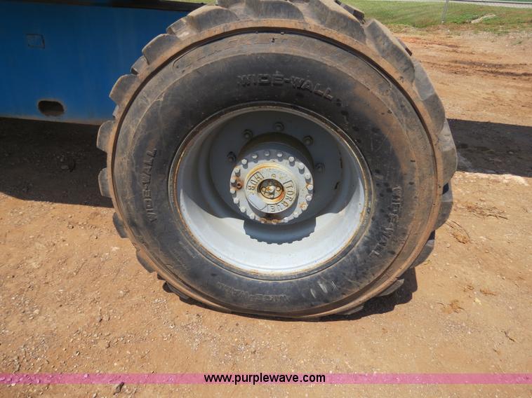 image for item B2387 1999 Genie Z-60/34 articulating boom lift