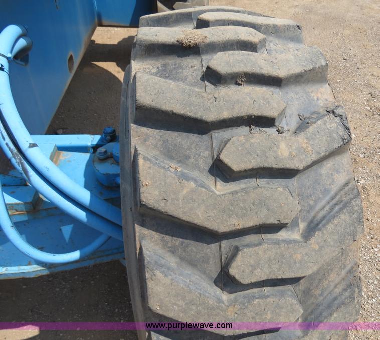 image for item B2387 1999 Genie Z-60/34 articulating boom lift