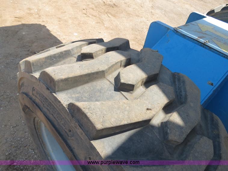 image for item B2387 1999 Genie Z-60/34 articulating boom lift