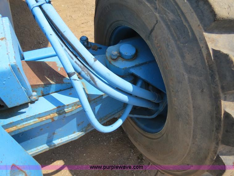 image for item B2387 1999 Genie Z-60/34 articulating boom lift