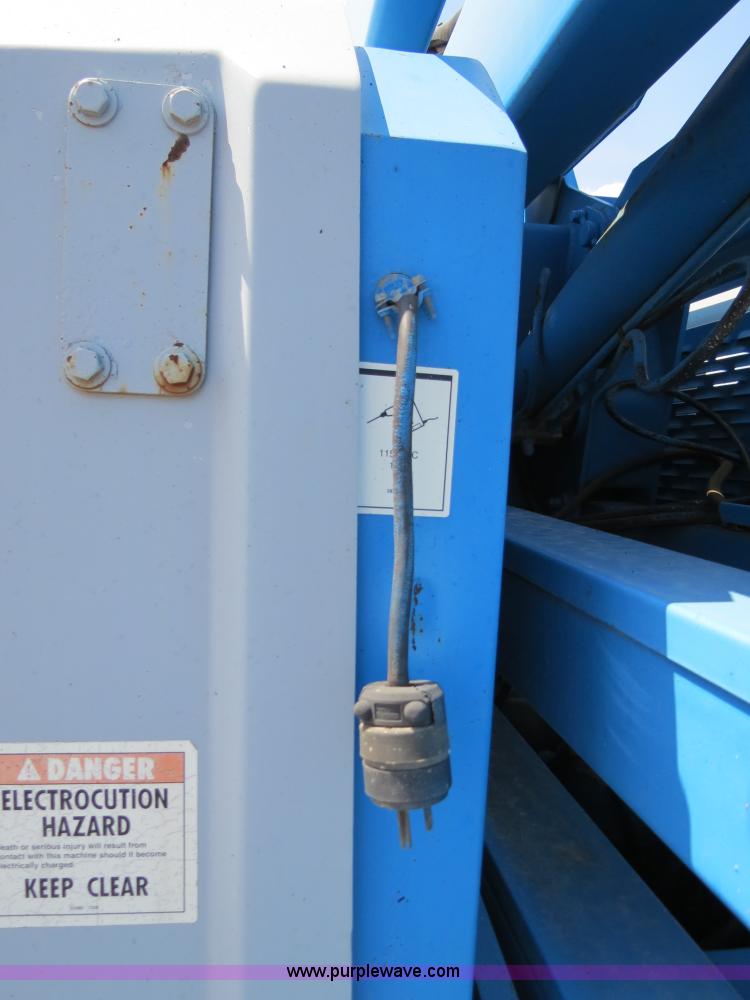 image for item B2387 1999 Genie Z-60/34 articulating boom lift