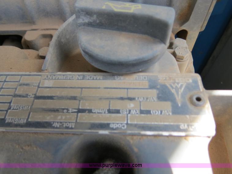 image for item B2408 1999 Genie S85 boom lift