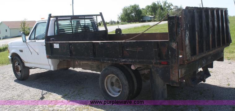 image for item B6787 1994 Ford F350 XL flatbed pickup truck