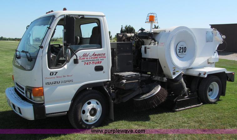 image for item C2212 2000 Isuzu vacuum truck with sweeper