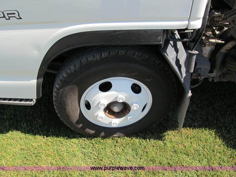 image for item C2212 2000 Isuzu vacuum truck with sweeper