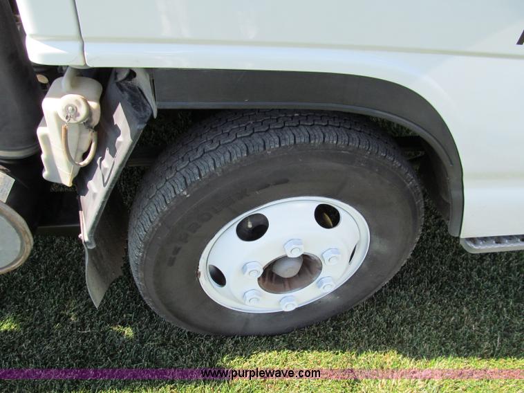 image for item C2212 2000 Isuzu vacuum truck with sweeper