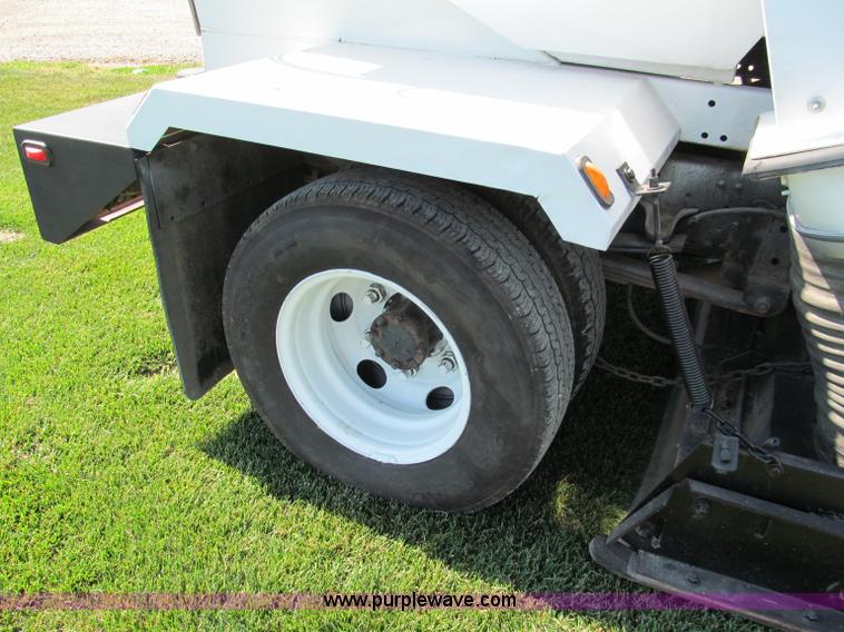 image for item C2212 2000 Isuzu vacuum truck with sweeper