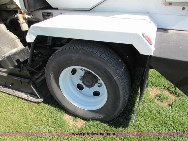 image for item C2212 2000 Isuzu vacuum truck with sweeper
