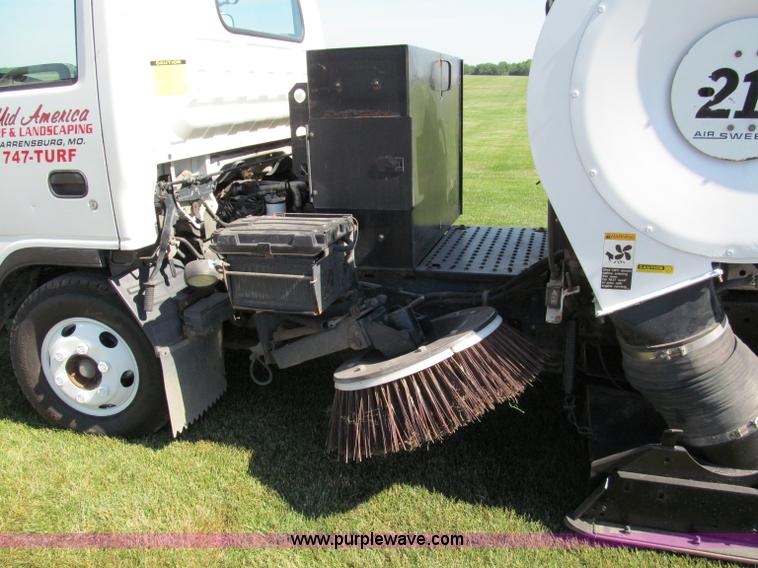 image for item C2212 2000 Isuzu vacuum truck with sweeper