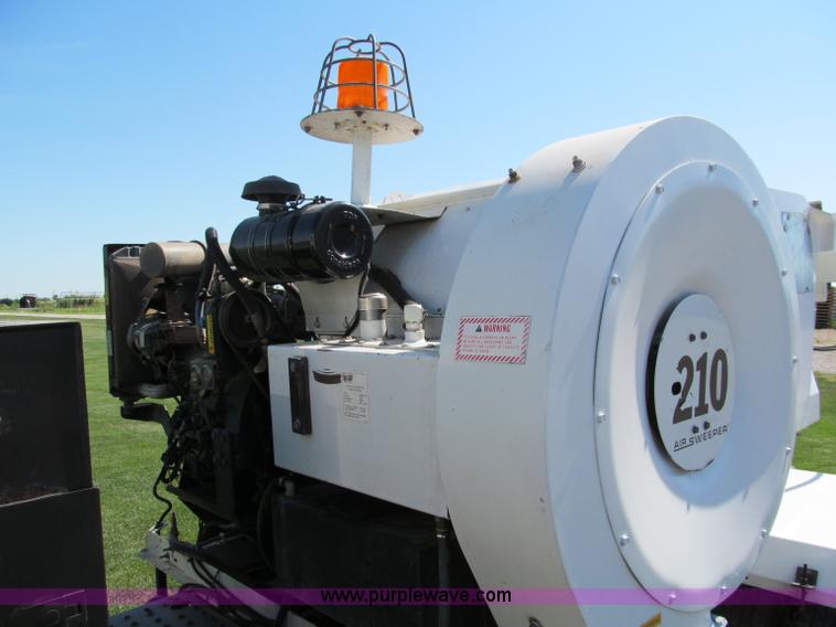 image for item C2212 2000 Isuzu vacuum truck with sweeper