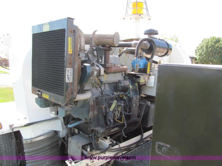 image for item C2212 2000 Isuzu vacuum truck with sweeper