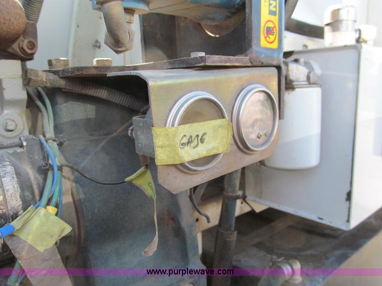 image for item C2212 2000 Isuzu vacuum truck with sweeper