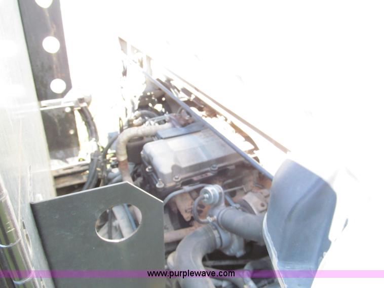 image for item C2212 2000 Isuzu vacuum truck with sweeper