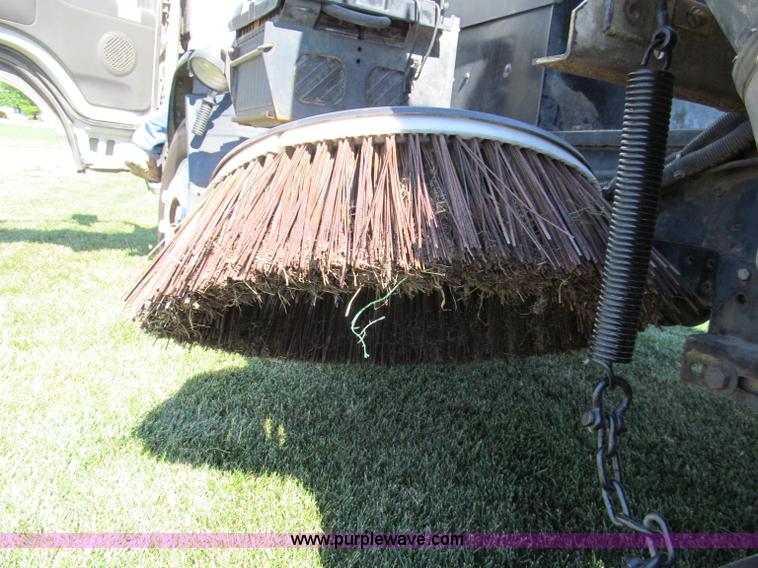 image for item C2212 2000 Isuzu vacuum truck with sweeper