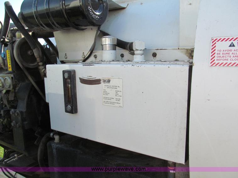 image for item C2212 2000 Isuzu vacuum truck with sweeper