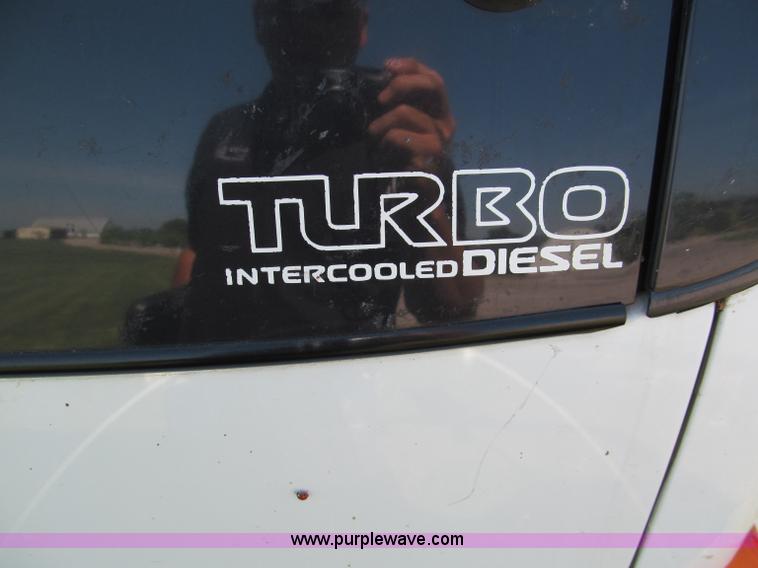 image for item C2212 2000 Isuzu vacuum truck with sweeper