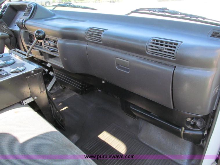 image for item C2212 2000 Isuzu vacuum truck with sweeper