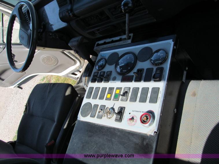 image for item C2212 2000 Isuzu vacuum truck with sweeper