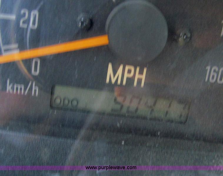 image for item C2212 2000 Isuzu vacuum truck with sweeper