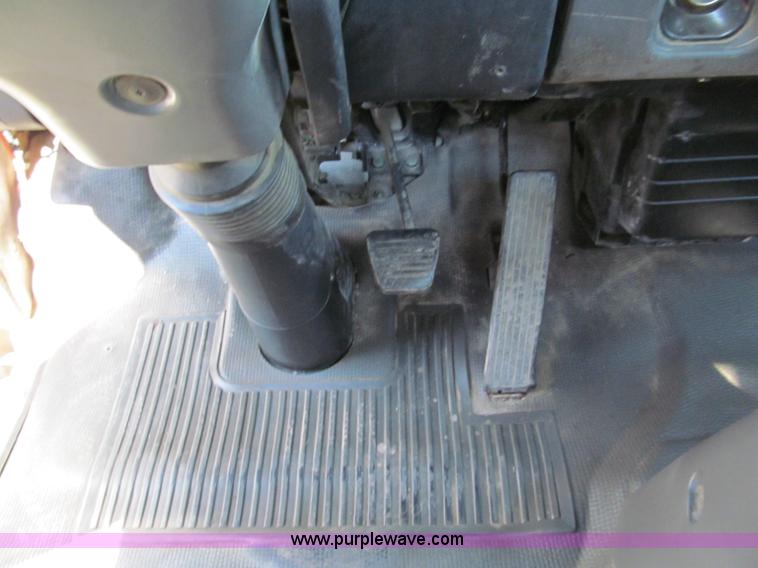 image for item C2212 2000 Isuzu vacuum truck with sweeper