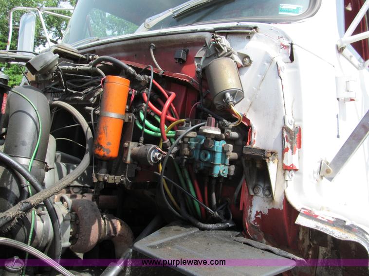 image for item C2220 1987 Ford L8000 concrete panel crane truck