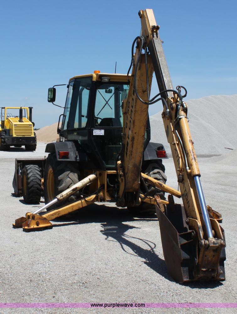 image for item D5110 Ford 675D backhoe