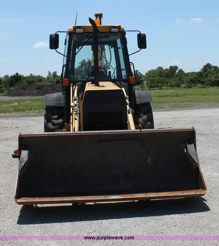 image for item D5110 Ford 675D backhoe