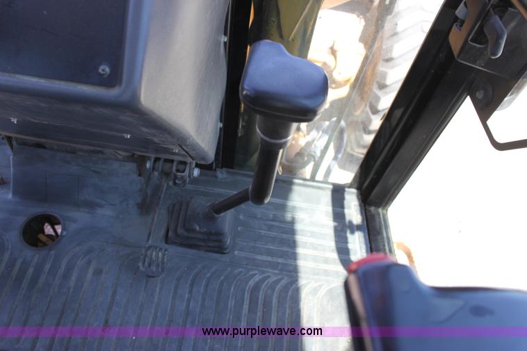 image for item D5110 Ford 675D backhoe