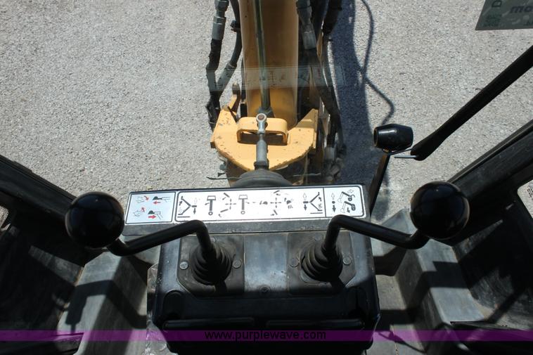 image for item D5110 Ford 675D backhoe