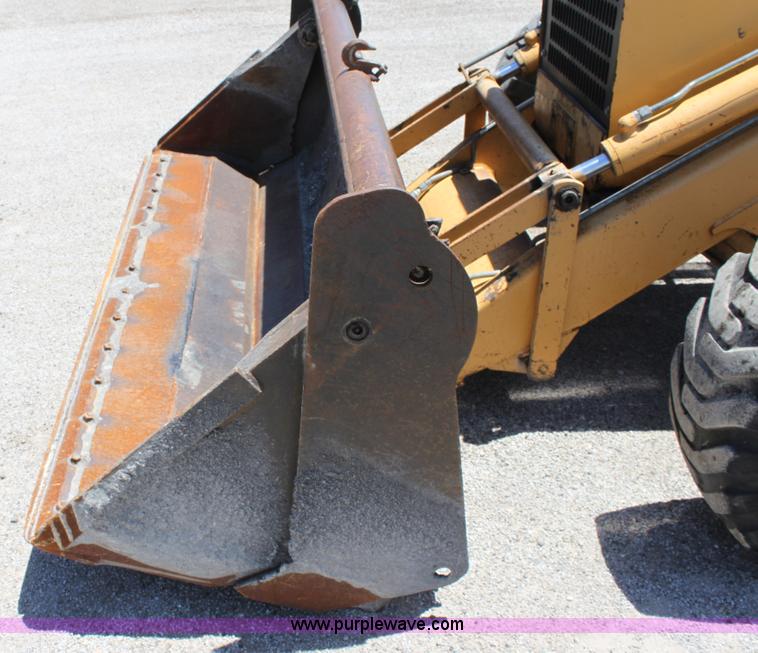 image for item D5110 Ford 675D backhoe