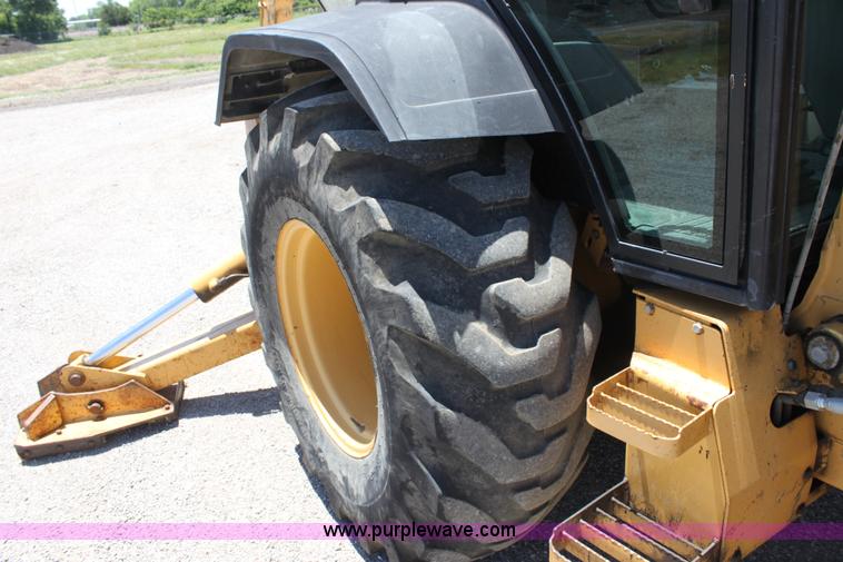 image for item D5110 Ford 675D backhoe