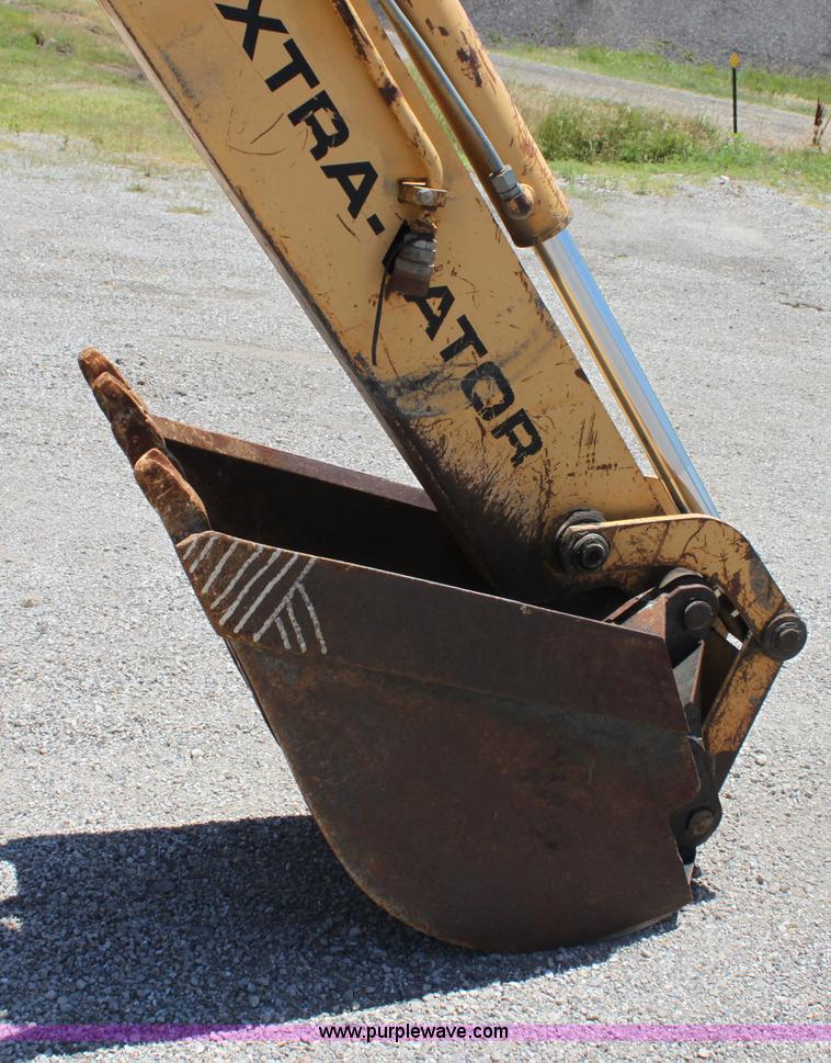 image for item D5110 Ford 675D backhoe