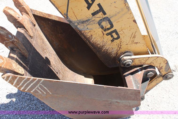 image for item D5110 Ford 675D backhoe