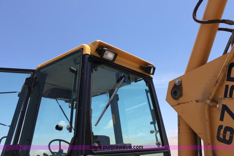 image for item D5110 Ford 675D backhoe