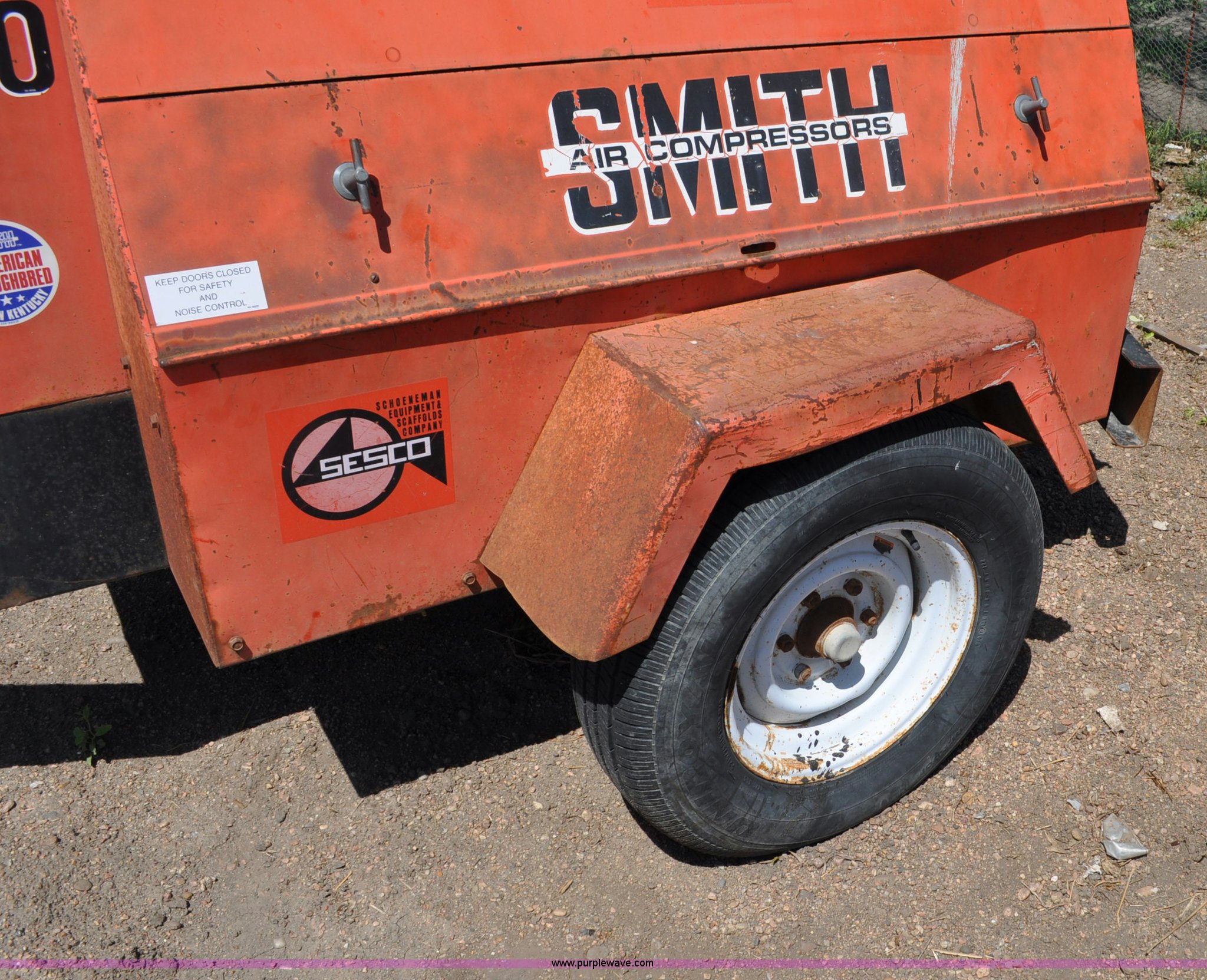 Smith 100 air compressor in Lexington, NE Item A5919 sold Purple Wave