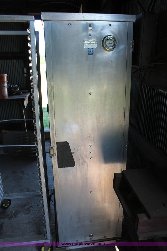 image for item L9816 Assorted warmers and storage rack