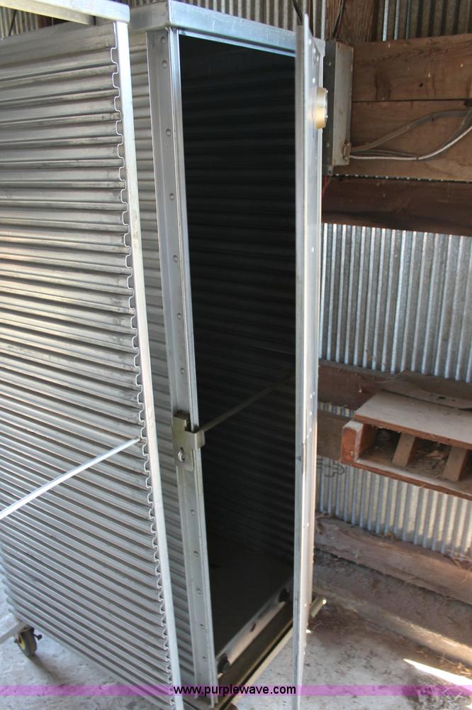 image for item L9816 Assorted warmers and storage rack