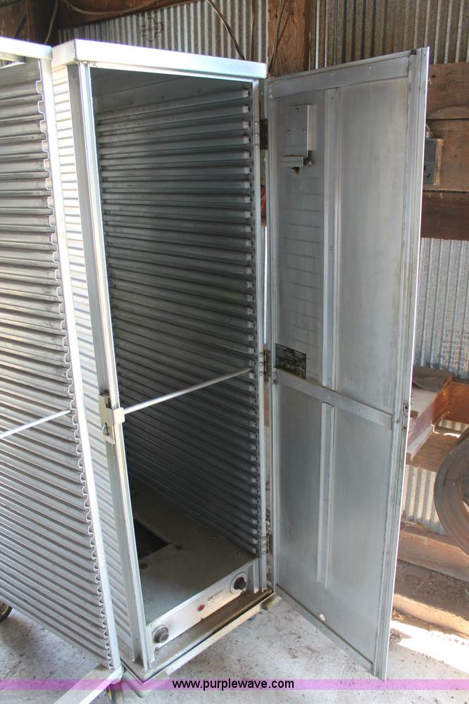 image for item L9816 Assorted warmers and storage rack