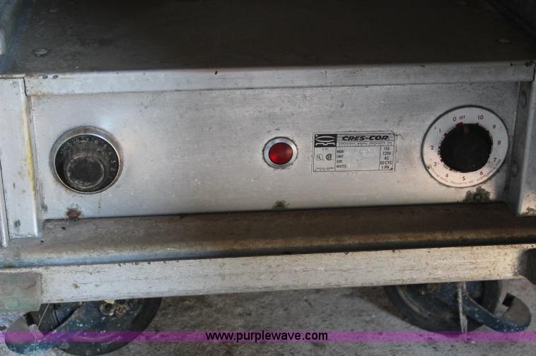 image for item L9816 Assorted warmers and storage rack