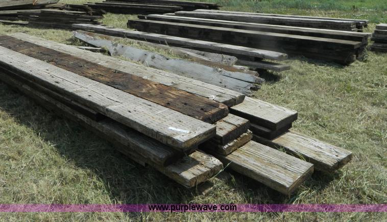 image for item M9878 (4) stacks of bridge planks