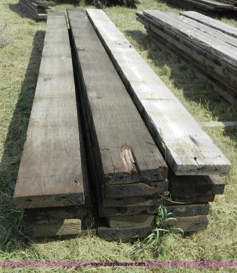 image for item M9878 (4) stacks of bridge planks