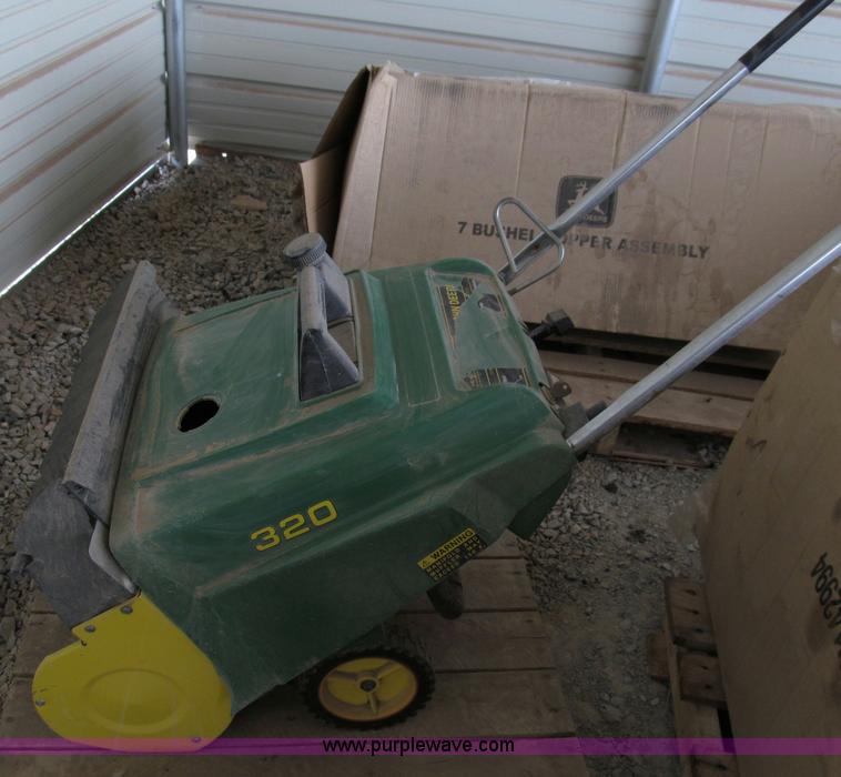 image for item C3510 John Deere 320 snow blower