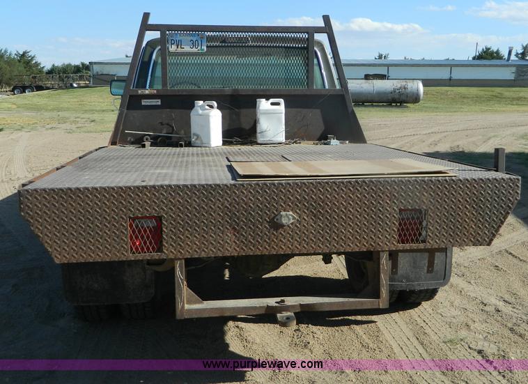 image for item M9766 1975 Ford F250 Ranger flatbed pickup truck
