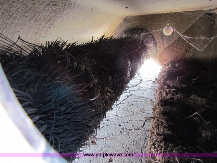 image for item B7279 Caterpillar BU118 street sweeper skid steer attachment