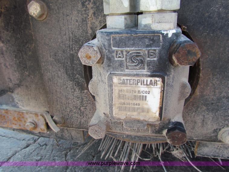 image for item B7279 Caterpillar BU118 street sweeper skid steer attachment