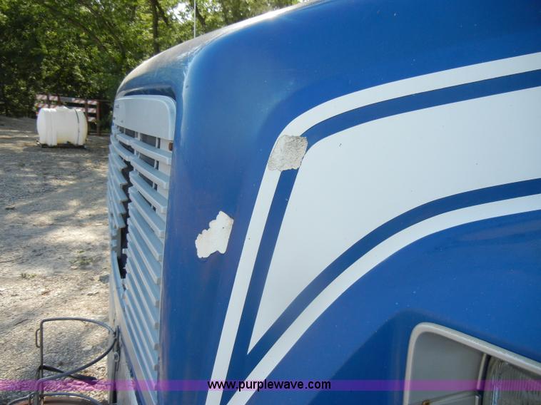 image for item D4247 1998 Freightliner F170 refuse truck