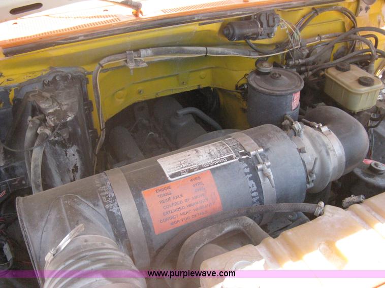 image for item A6428 1990 Ford F800 flatbed crane truck