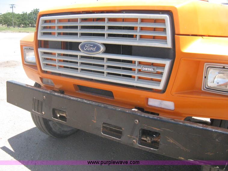 image for item A6428 1990 Ford F800 flatbed crane truck