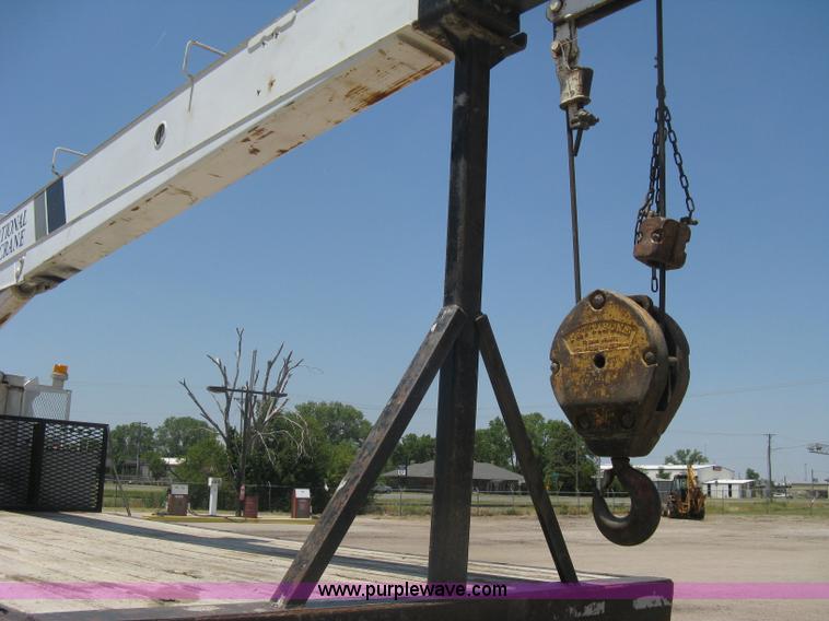 image for item A6428 1990 Ford F800 flatbed crane truck